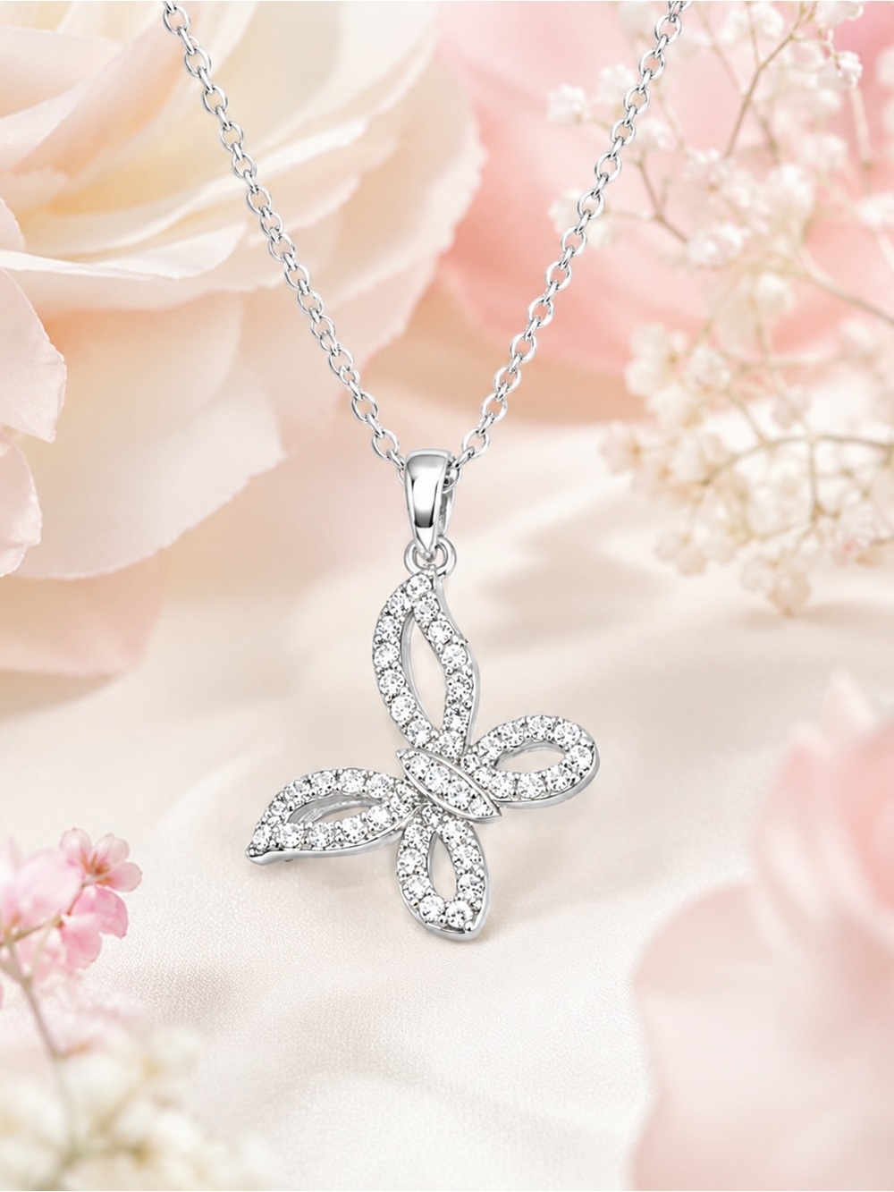 Silver necklace with sparkly crystals butterfly pendant